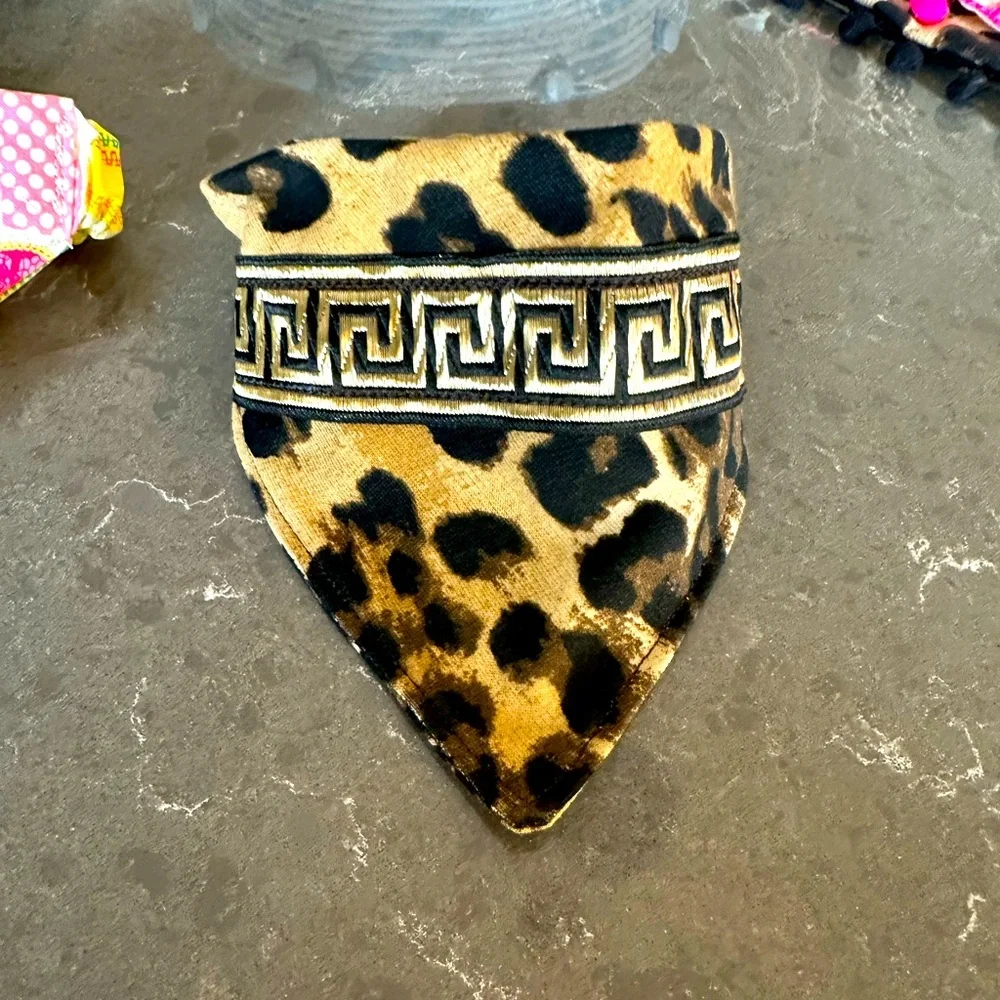 Handcrafted dog bandanna in Sm. Measures 13 to 15 inches around.